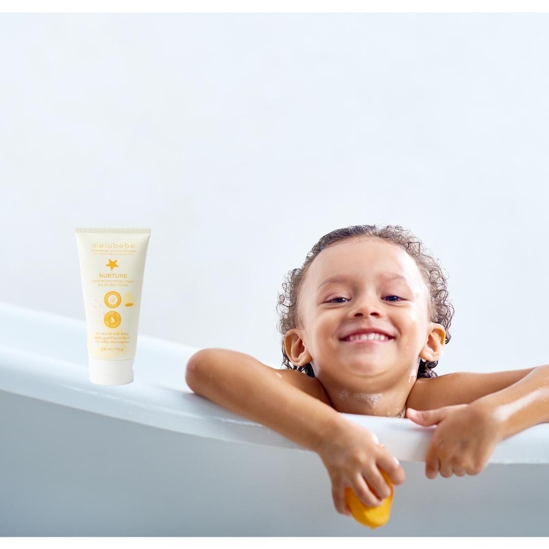 Boy taking bath with Melabebe Nurture Daily Moisturizing Creme